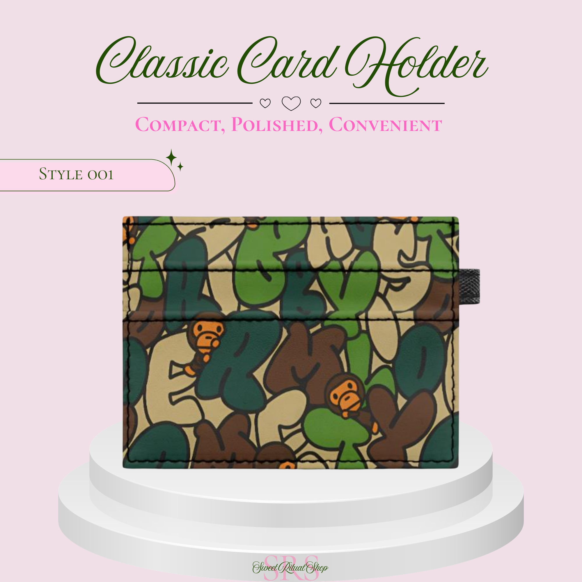 A classic card holder wallet with a green, brown, and beige camouflage pattern featuring cartoon monkey illustrations, displayed on a white tiered pedestal against a light pink background with promotional text.