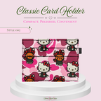 A pink Hello Kitty card holder wallet with a pink camouflage pattern and cartoon character prints, displayed on a white pedestal against a light pink background with promotional text.
